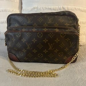 Louis Vuitton crossbody. Unbranded strap.